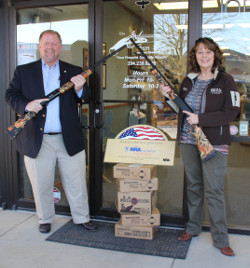 Gene Newman presents OWU founder, Rebecca Wood, with NRA Foundation Grant